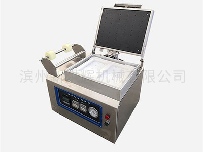 微型貼體(ti)包裝機