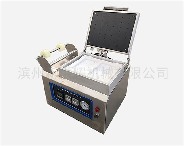 微型貼體(ti)包裝機